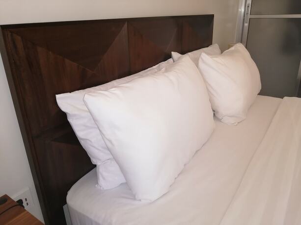 Imagen de la habitación del Hotel Harman Suites Moalboal. Foto 37