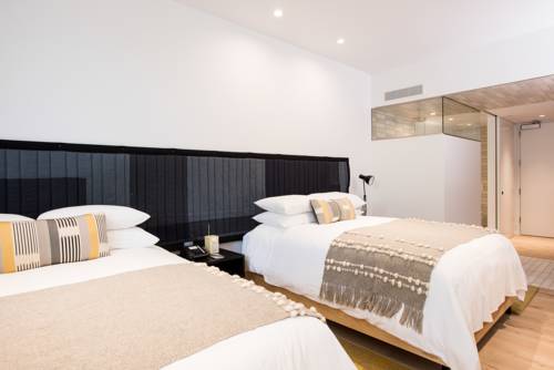 Imagen de la habitación del Hotel Harmon Guest House. Foto 3