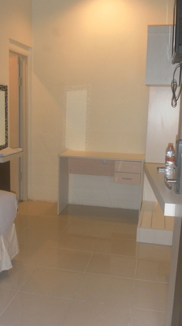 Imagen de la habitación del Hotel Harmoni Inn Pelabuhan Makassar. Foto 6