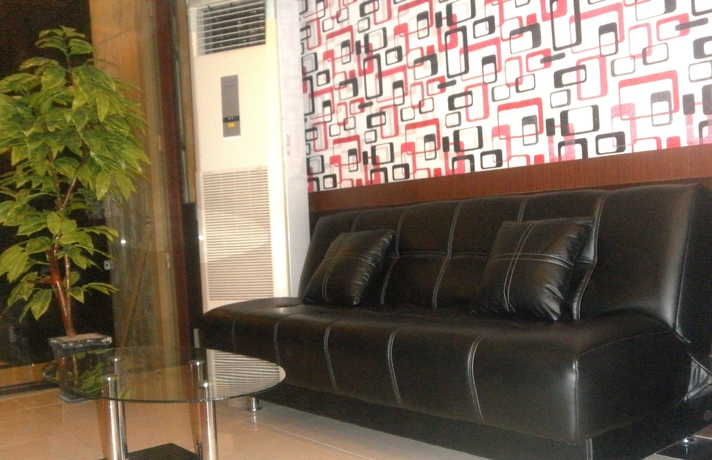 Imagen de los interiores del Hotel Harmoni Inn Pelabuhan Makassar. Foto 11