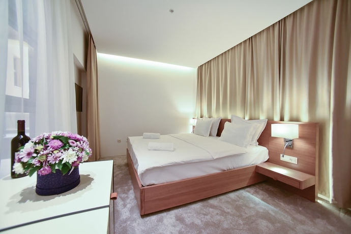 Imagen de la habitación del Hotel Harmonia Residence. Foto 5