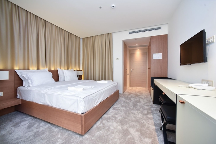 Imagen de la habitación del Hotel Harmonia Residence. Foto 6