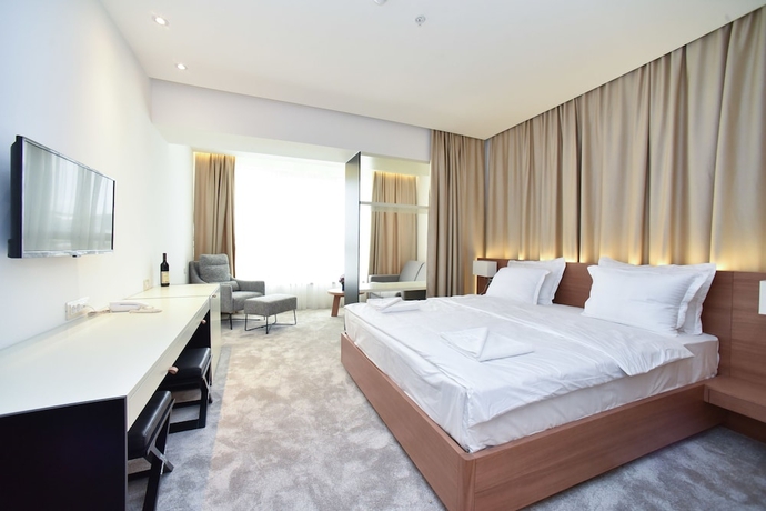 Imagen de la habitación del Hotel Harmonia Residence. Foto 7