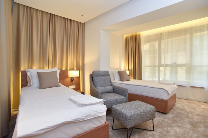 Imagen de la habitación del Hotel Harmonia Residence. Foto 8