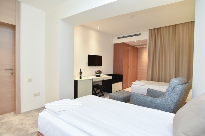 Imagen de la habitación del Hotel Harmonia Residence. Foto 10