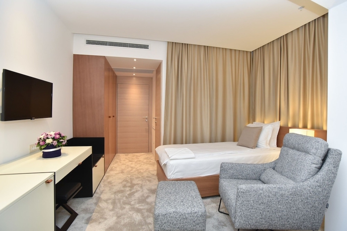 Imagen de la habitación del Hotel Harmonia Residence. Foto 11