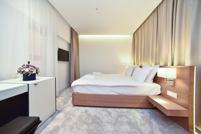 Imagen de la habitación del Hotel Harmonia Residence. Foto 13