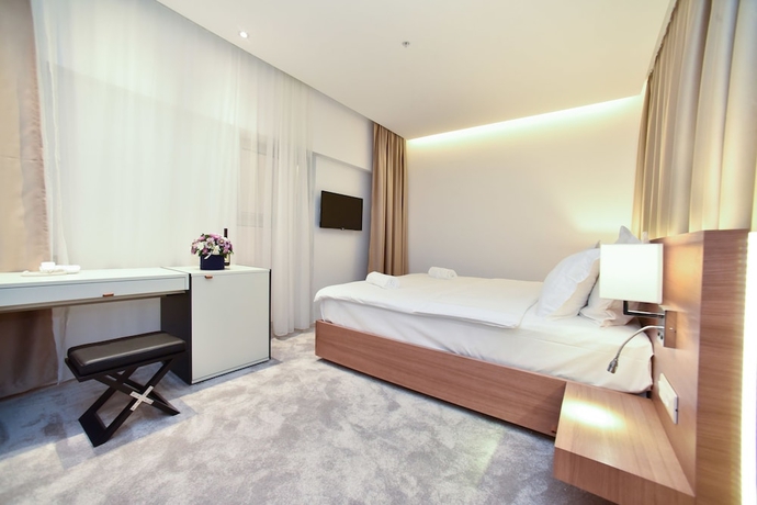 Imagen de la habitación del Hotel Harmonia Residence. Foto 15