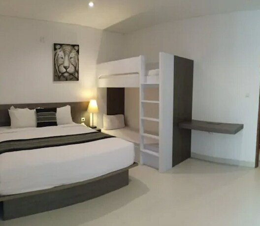 Imagen de la habitación del Hotel Harmony Beach Suite. Foto 18