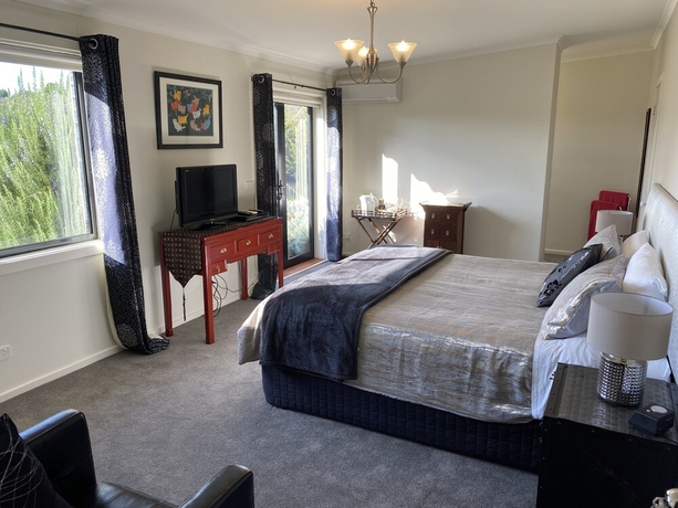 Imagen de la habitación del Hotel Harmony Bed and Breakfast. Foto 13