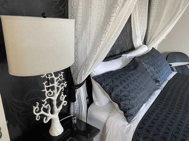 Imagen de la habitación del Hotel Harmony Bed and Breakfast. Foto 15