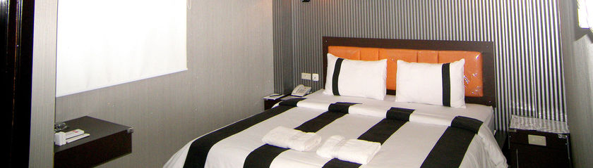 Imagen de la habitación del Hotel Harmony In Pontianak. Foto 2