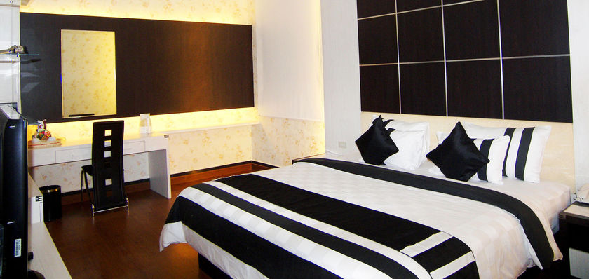 Imagen de la habitación del Hotel Harmony In Pontianak. Foto 3