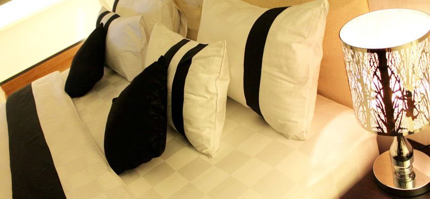 Imagen de la habitación del Hotel Harmony In Pontianak. Foto 7