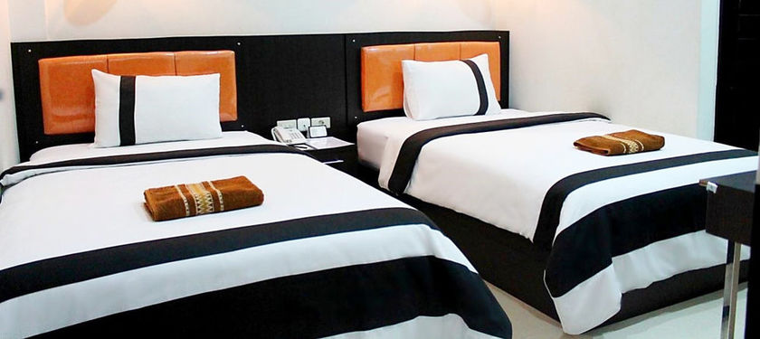 Imagen de los interiores del Hotel Harmony In Pontianak. Foto 11
