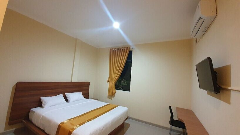 Imagen de la habitación del Hotel Harmony Inn Belitung. Foto 14