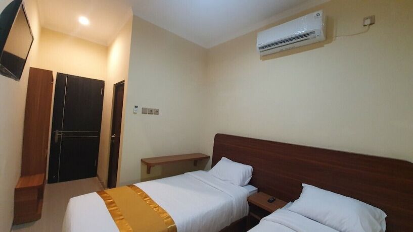 Imagen de la habitación del Hotel Harmony Inn Belitung. Foto 16