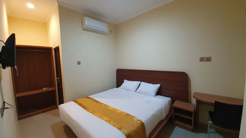 Imagen de la habitación del Hotel Harmony Inn Belitung. Foto 17