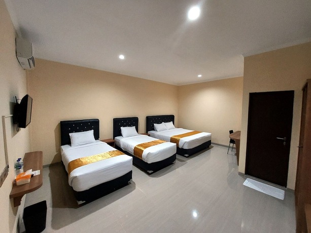 Imagen de la habitación del Hotel Harmony Inn Belitung. Foto 18