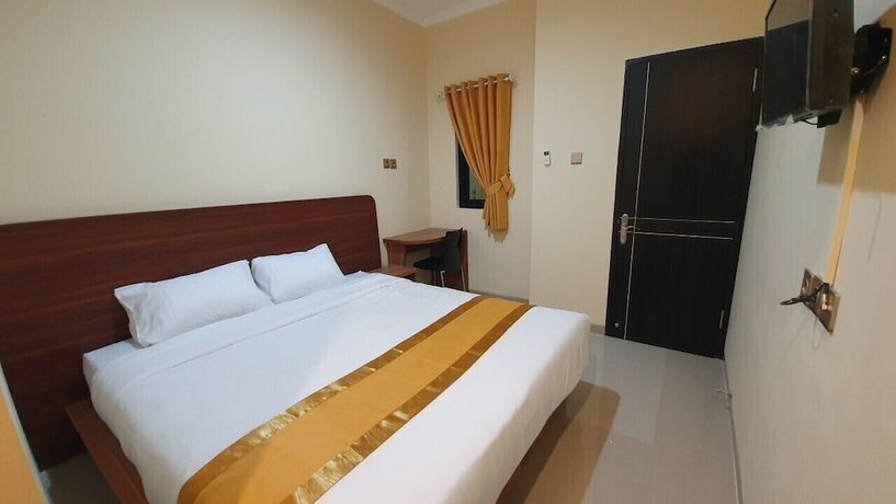 Imagen de la habitación del Hotel Harmony Inn Belitung. Foto 19