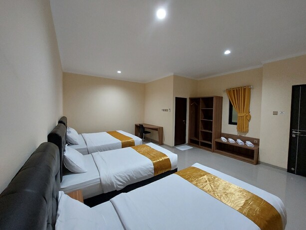 Imagen de la habitación del Hotel Harmony Inn Belitung. Foto 20