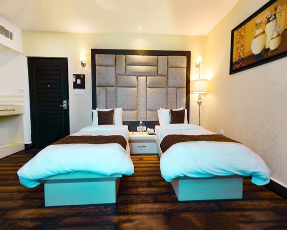Imagen de la habitación del Hotel Harmony Inn, Meerut. Foto 5