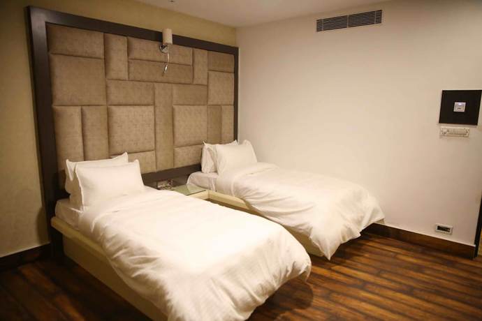 Imagen de la habitación del Hotel Harmony Inn, Meerut. Foto 6