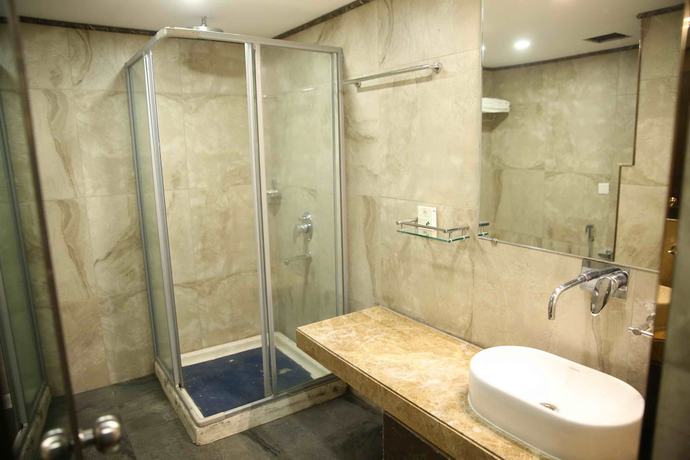 Imagen de la habitación del Hotel Harmony Inn, Meerut. Foto 7
