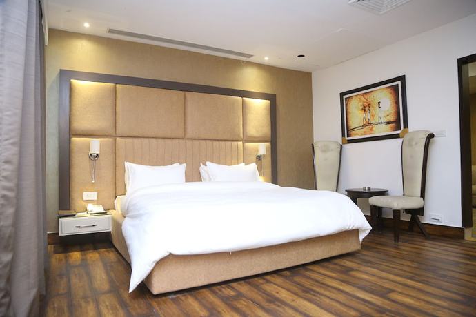 Imagen de la habitación del Hotel Harmony Inn, Meerut. Foto 9