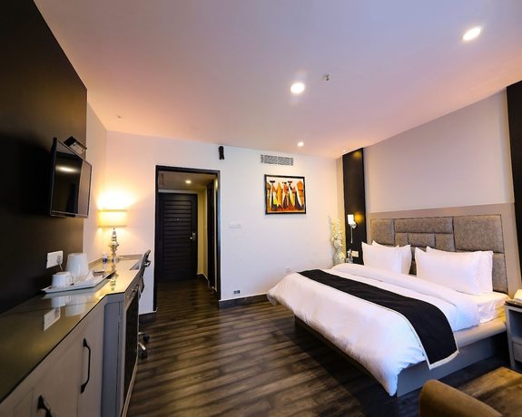 Imagen de la habitación del Hotel Harmony Inn, Meerut. Foto 12