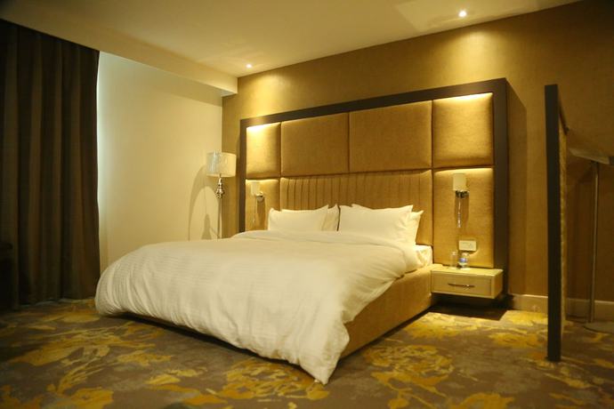 Imagen de la habitación del Hotel Harmony Inn, Meerut. Foto 13