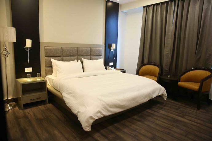 Imagen de la habitación del Hotel Harmony Inn, Meerut. Foto 15