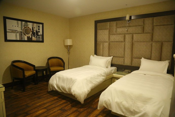 Imagen de la habitación del Hotel Harmony Inn, Meerut. Foto 16