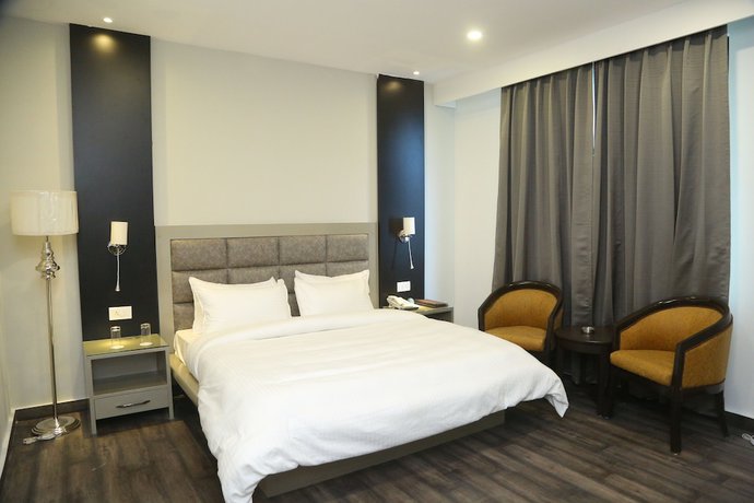 Imagen de la habitación del Hotel Harmony Inn, Meerut. Foto 17