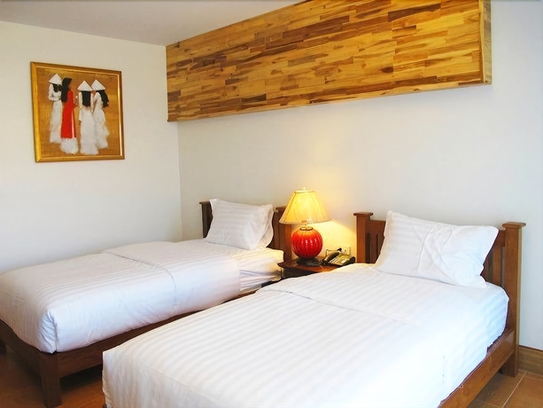 Imagen de la habitación del Hotel Harmony Inn, PATTAYA BEACH. Foto 8