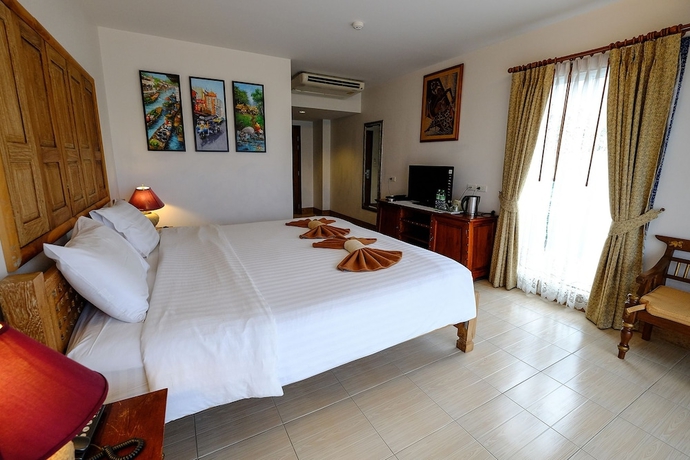 Imagen de la habitación del Hotel Harmony Inn, PATTAYA BEACH. Foto 13