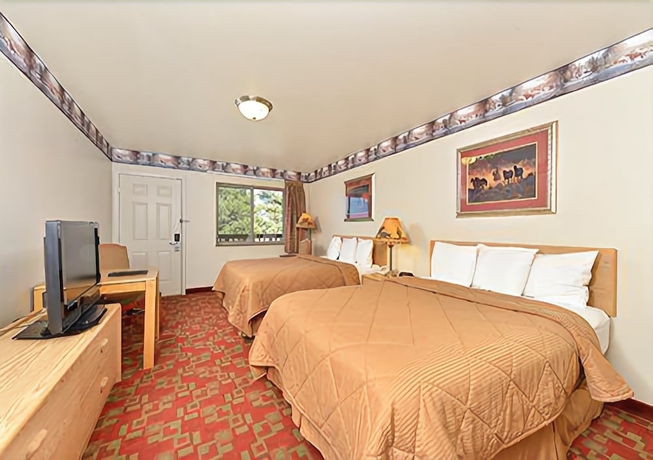 Imagen de la habitación del Hotel Harmony Inn and Suites. Foto 11