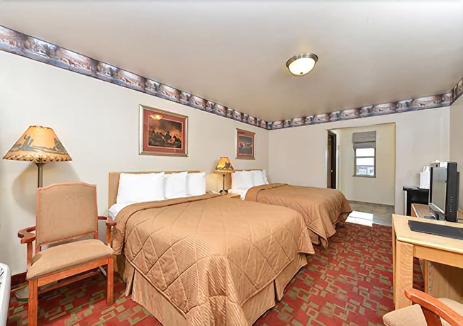 Imagen de la habitación del Hotel Harmony Inn and Suites. Foto 12