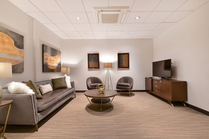 Imagen del bar/restaurante del Hotel Harmony Medical Suites China Town. Foto 4