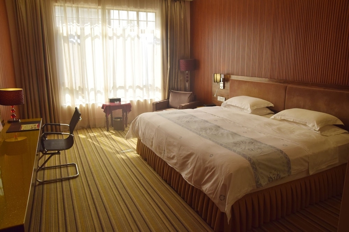 Imagen de la habitación del Hotel Harmony Resort, Zhuhai. Foto 7