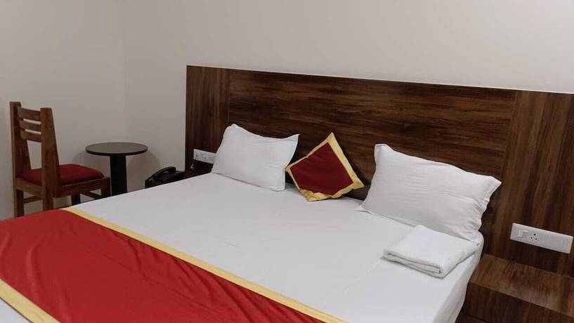 Imagen de la habitación del Hotel Harmony Rooms And Banquet. Foto 3