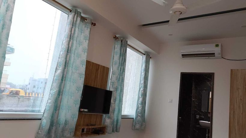 Imagen de la habitación del Hotel Harmony Rooms And Banquet. Foto 4