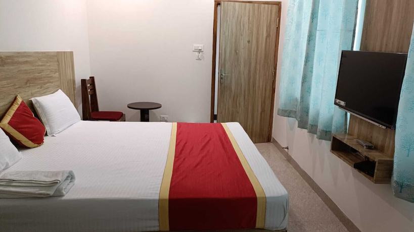 Imagen de la habitación del Hotel Harmony Rooms And Banquet. Foto 5