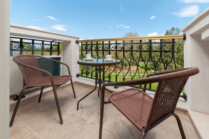 Imagen de la habitación del Hotel Harmony Suites Grand Resort. Foto 8