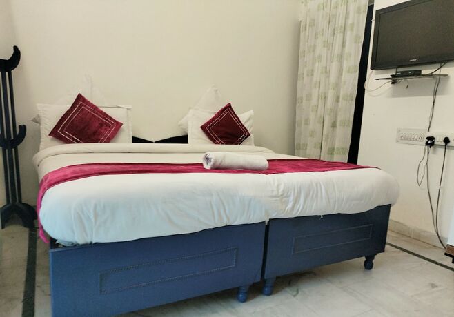 Imagen de la habitación del Hotel Harpalsar Haveli Jaipur. Foto 4