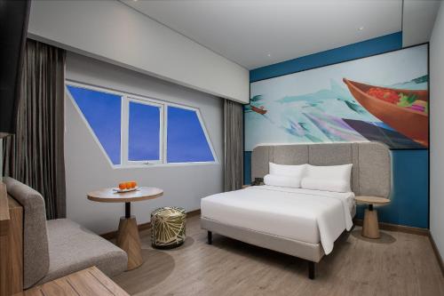 Imagen de la habitación del Hotel Harper Banjarmasin. Foto 6