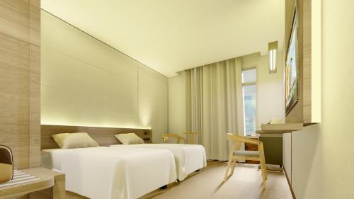 Imagen de la habitación del Hotel Harper Kupang. Foto 2