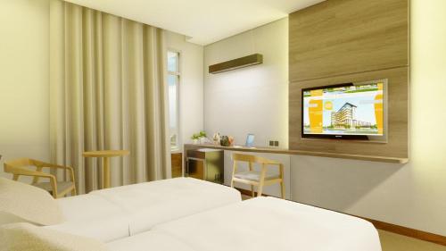 Imagen de la habitación del Hotel Harper Kupang. Foto 4