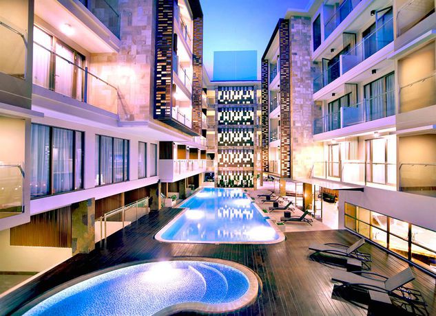 Imagen de la piscina del Hotel Harper Kuta By Aston - Chse Certified. Foto 12