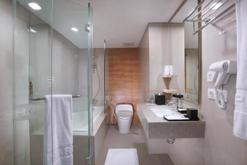 Imagen de la habitación del Hotel Harper Mt Haryono By Aston. Foto 9